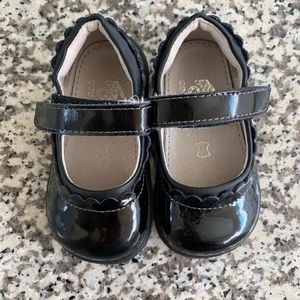 Black patent leather shoes.